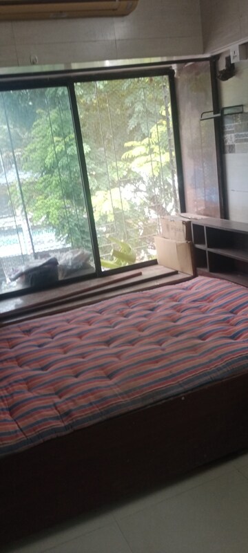 Bedroom in 1 BHK Apartment at Mahakali Model Town, Jogeshwari East – for Rent