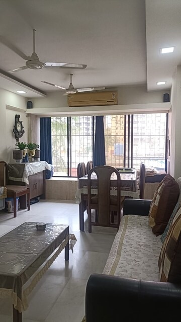 Living Room in 2 BHK Apartment at Beacon CHS, Santacruz West – for Rent