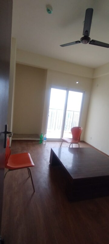 Living Room in 2 BHK Apartment at Amrapali Enchante, Tech Zone 4 Greater Noida – for Rent