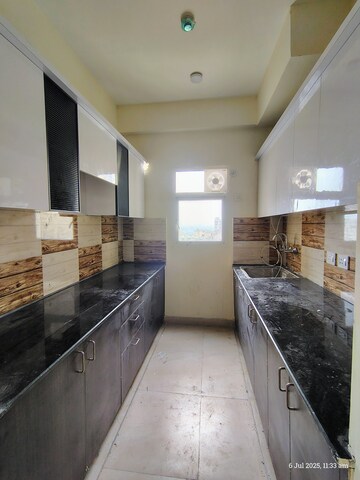 Kitchen in 3 BHK Apartment at Amrapali Enchante, Tech Zone 4 Greater Noida – for Rent