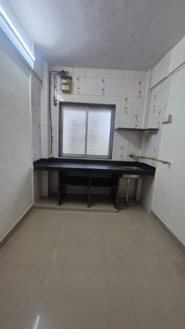 Kitchen in 1 BHK Apartment at Gokul Paradise, Kandivali East – for Rent
