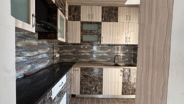 Kitchen in 3 BHK Apartment at Amrapali Crystal Homes, Sector 76 – for Rent