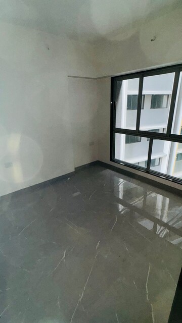 Living Room in 1 BHK Apartment at Veena Smart Homes, Kandivali West – for Sale