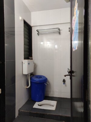 Bathroom in 1 BHK Apartment at Shanti Ananya CHS, Kopar Khairane – for Sale