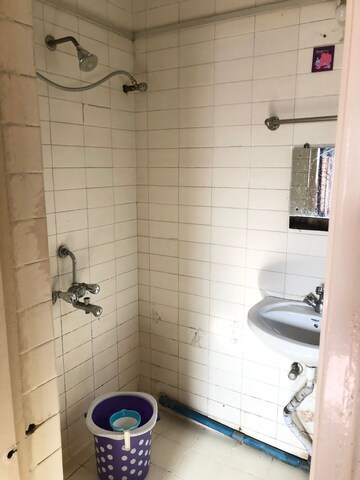Bathroom in 3 BHK Apartment at Rajas Society – for Rent