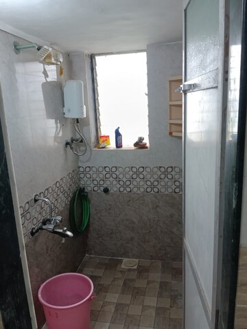 Bathroom in 1 BHK Apartment at Padma Prabha CHS, Bangur Nagar – for Rent
