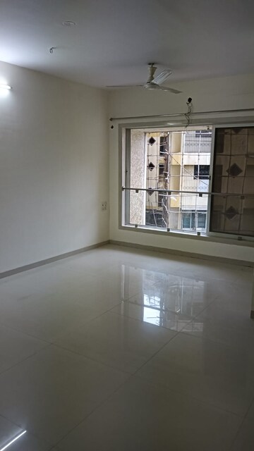 Room in 2 BHK Apartment at Romell Diva, Malad West – for Rent