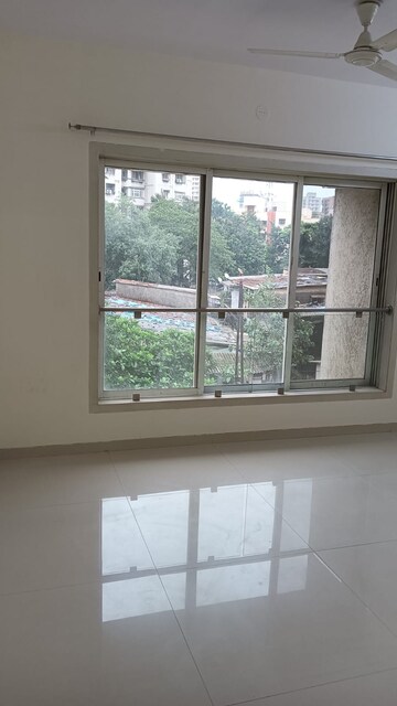 Room in 2 BHK Apartment at Romell Diva, Malad West – for Rent