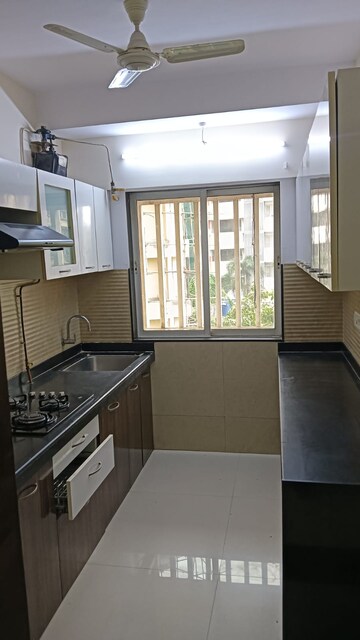 Kitchen in 2 BHK Apartment at Romell Diva, Malad West – for Rent