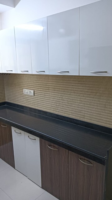Kitchen in 2 BHK Apartment at Romell Diva, Malad West – for Rent