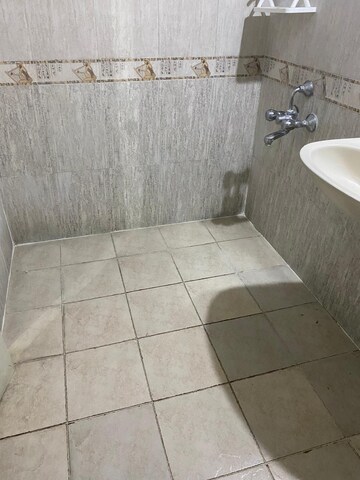 Bathroom in 2 BHK Apartment at Amrut Runwal Daffodils, Nibm – for Sale