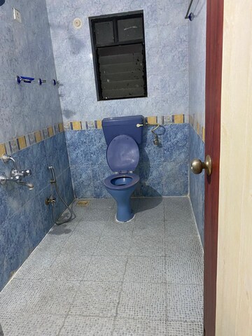 Bathroom in 2 BHK Apartment at Amrut Runwal Daffodils, Nibm – for Sale