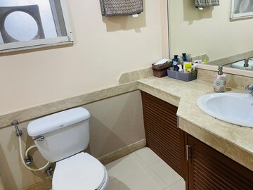 Bathroom in 2 BHK Apartment at Hiranandani Meadows, Manpada – for Rent