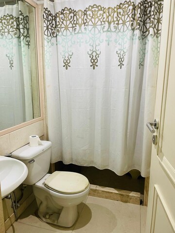 Bathroom in 2 BHK Apartment at Hiranandani Meadows, Manpada – for Rent
