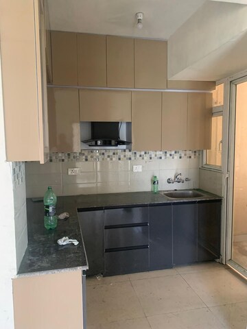 Kitchen in 2 BHK Apartment at Signature Global Orchard Avenue, Sector 93 – for Rent
