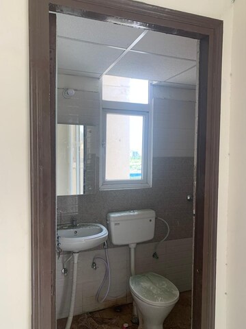 Bathroom in 2 BHK Apartment at Signature Global Orchard Avenue, Sector 93 – for Rent