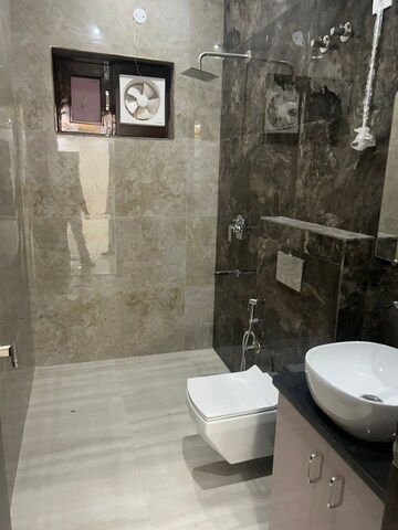 Bathroom in 3.5 BHK Builder Floor at Ansal API Esencia, Sector 67 – for Rent