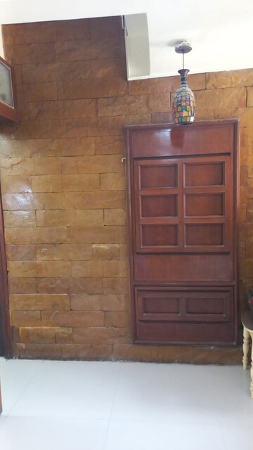 Living Room in 1.5 BHK Apartment at Shree Shastri Krupa CHS, Andheri West – for Rent
