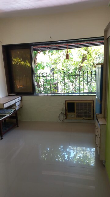 Living Room in 1.5 BHK Apartment at Shree Shastri Krupa CHS, Andheri West – for Rent