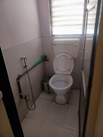 Bathroom in 1 BHK Apartment at Osho Park, Naupada – for Rent