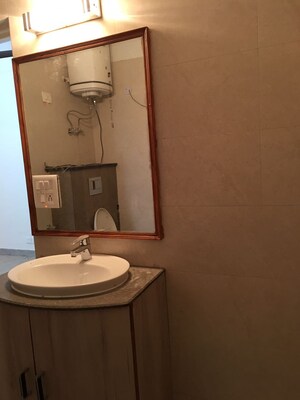 Bathroom in 3 BHK Apartment at East Of Kailash – for Rent