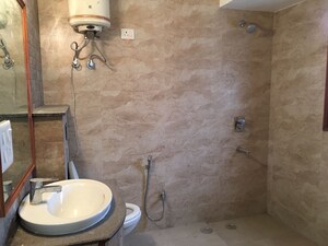 Bathroom in 3 BHK Apartment at East Of Kailash – for Rent