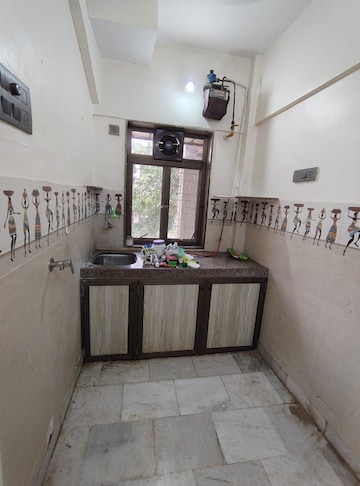 Kitchen in 2 BHK Apartment at Harjas CHS, Ic Colony – for Rent