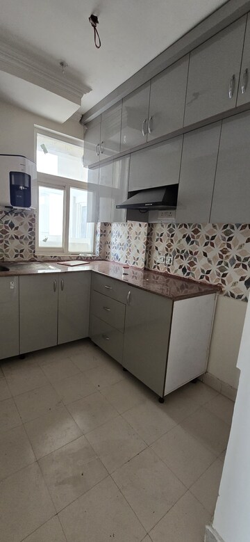 Kitchen in 3 BHK Apartment at Amrapali Riverview, Amrapali Leisure Valley – for Rent