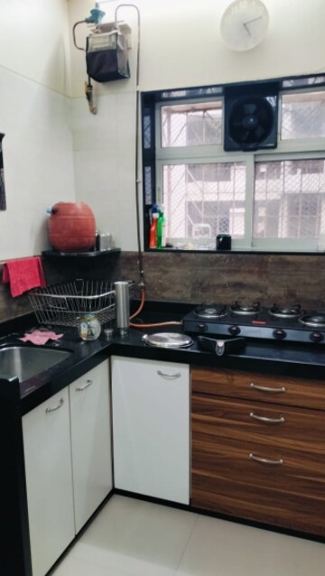 Kitchen in 2 BHK Apartment at Mathew Mansion, Ic Colony – for Rent