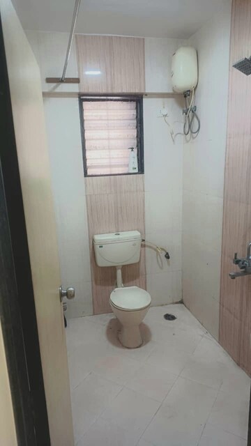 Bathroom in 2 BHK Apartment at Mohini Castle, Khar West – for Rent