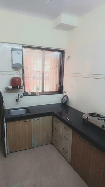 Kitchen in 2 BHK Apartment at Mohini Castle, Khar West – for Rent