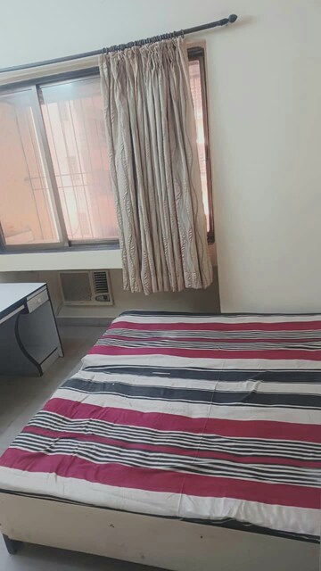 Bedroom in 2 BHK Apartment at Mohini Castle, Khar West – for Rent
