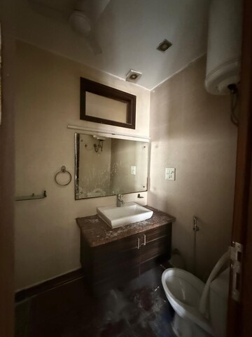 Bathroom in 3 BHK Builder Floor at Kalkaji – for Rent