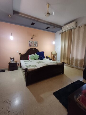 Bedroom in 2 BHK Builder Floor at Nehru Enclave – for Rent