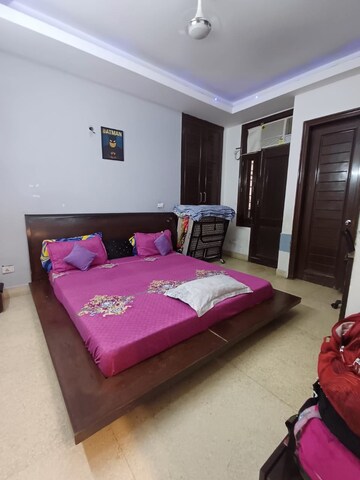 Bedroom in 2 BHK Builder Floor at Nehru Enclave – for Rent