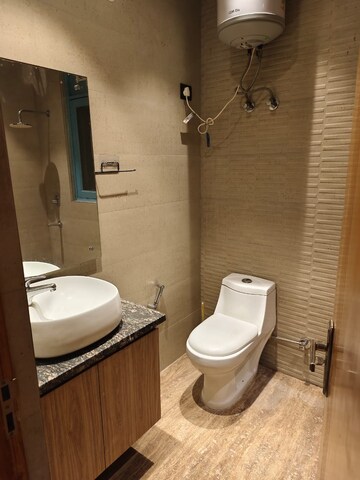 Bathroom in 4 BHK Builder Floor at Defence Colony – for Rent