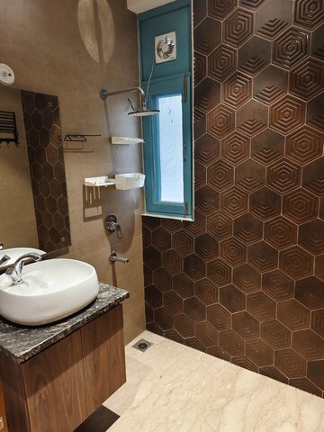 Bathroom in 4 BHK Builder Floor at Defence Colony – for Rent