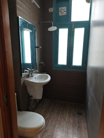 Bathroom in 4 BHK Builder Floor at Defence Colony – for Rent
