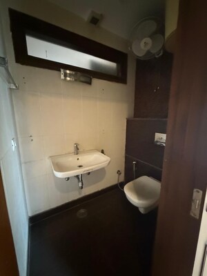 Bathroom in 6 BHK Builder Floor at Nehru Enclave – for Sale