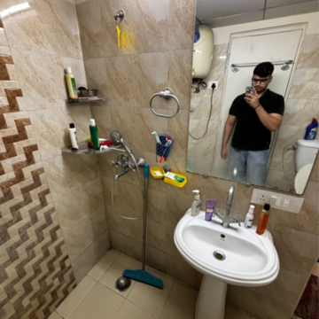 Bathroom in 3 BHK Apartment at Gaur Atulyam, Omicron I Greater Noida – for Rent