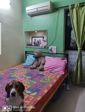 Bedroom in 2 BHK Apartment at Karnatak CHS, Mahim – for Sale