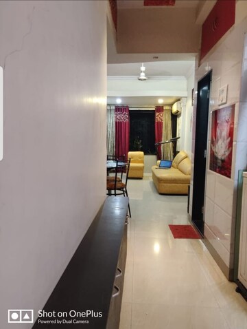Living Room in 2 BHK Apartment at Karnatak CHS, Mahim – for Sale