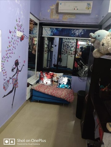 Bedroom in 2 BHK Apartment at Karnatak CHS, Mahim – for Sale