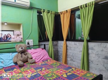 Bedroom in 2 BHK Apartment at Karnatak CHS, Mahim – for Sale