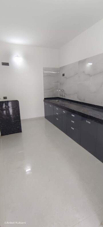 Kitchen in 2 BHK Apartment at Unique K Ville, Ravet – for Sale