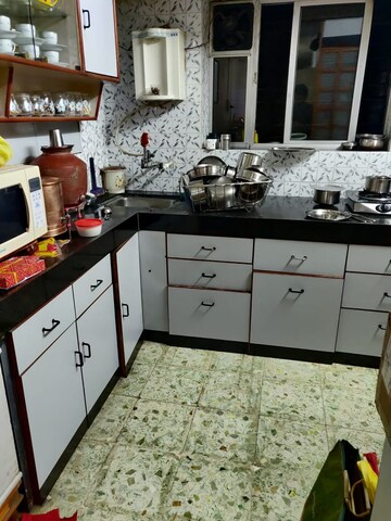 Kitchen in 2 BHK Apartment at Rupali Heights Dahanukar Colony, Kothrud – for Rent
