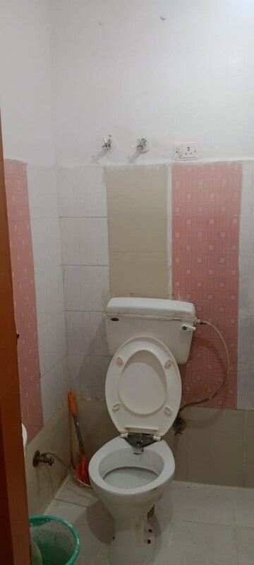 Bathroom in 2 BHK Apartment at RWA Qutab Enclave, Katwaria Sarai – for Sale