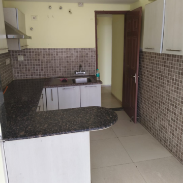 Kitchen in 2 BHK Apartment at Jaypee Greens Pavilion Court, Sector 128 – for Rent