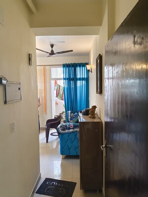 Living Room in 2 BHK Apartment at Viddhi Tower, Mahagunpuram – for Sale