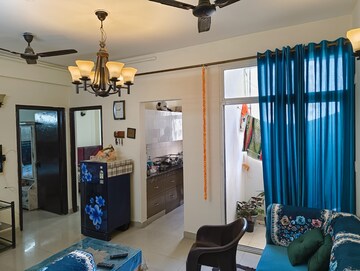 Living Room in 2 BHK Apartment at Viddhi Tower, Mahagunpuram – for Sale
